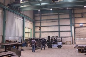 Interior photo of a large industrial warehouse. 