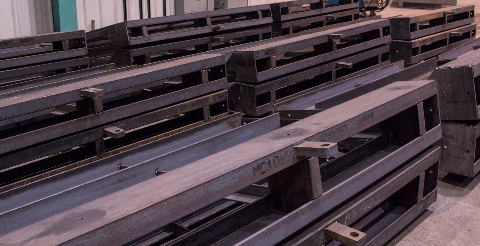 Steel parts stacked for shipping.