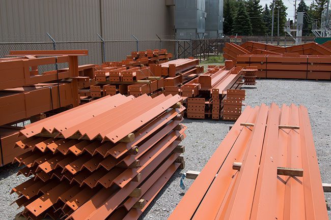 structural-steel-custom-fabricator-swanton-welding.jpg structural steel fabricator Swanton Welding created Steel Beams Piled for Transports