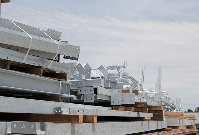 Steel I-beams being transported