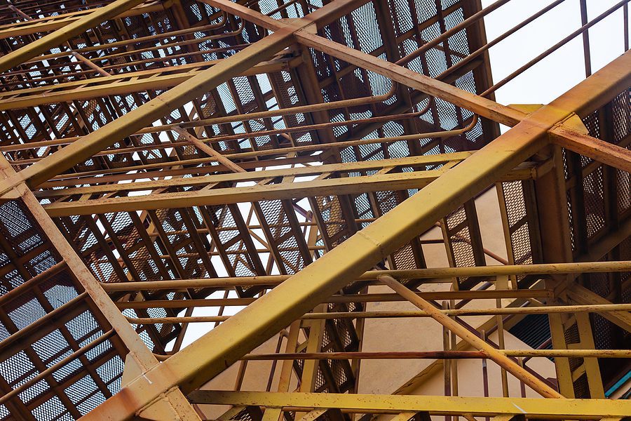 Large industrial structural steel building frame.