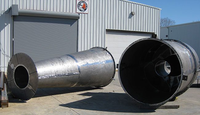 Metal rolled parts outside Swanton Welding Facility.