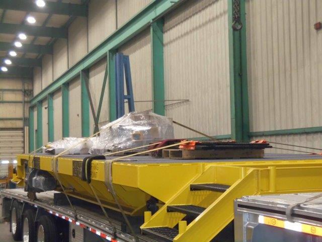 125 ton steam car project on a flat bed truck getting ready to ship out.