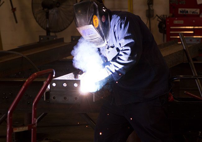 Swanton Welding welder in action working on steel project